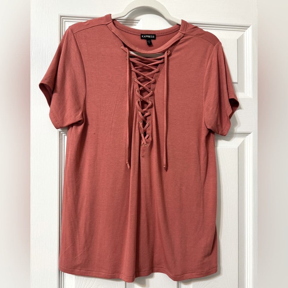 Like new! Express Women size Small. Deep lace up V-neck detail. Sexy & Casual!